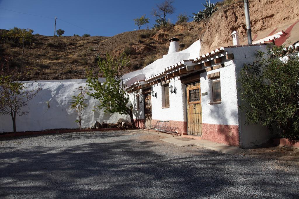 Отель Casas Cueva Y Cortijo La Tala En Гвадикс Номер фото