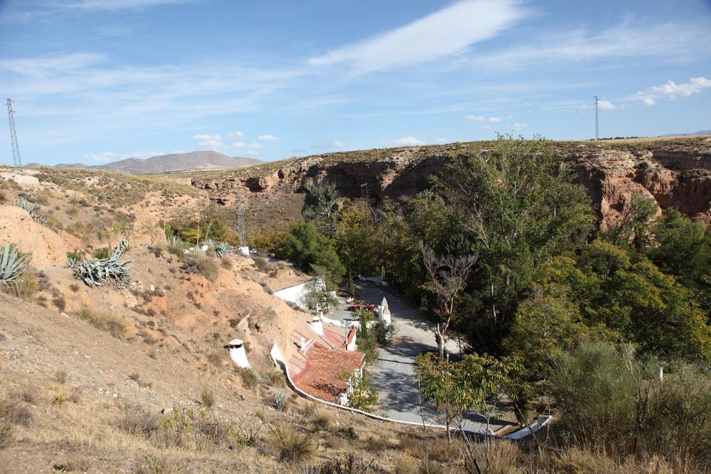 Отель Casas Cueva Y Cortijo La Tala En Гвадикс Номер фото